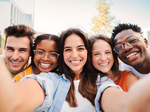 Group,Of,Happy,Multiracial,Teenagers,Having,Fun,Smiling,Taking,A