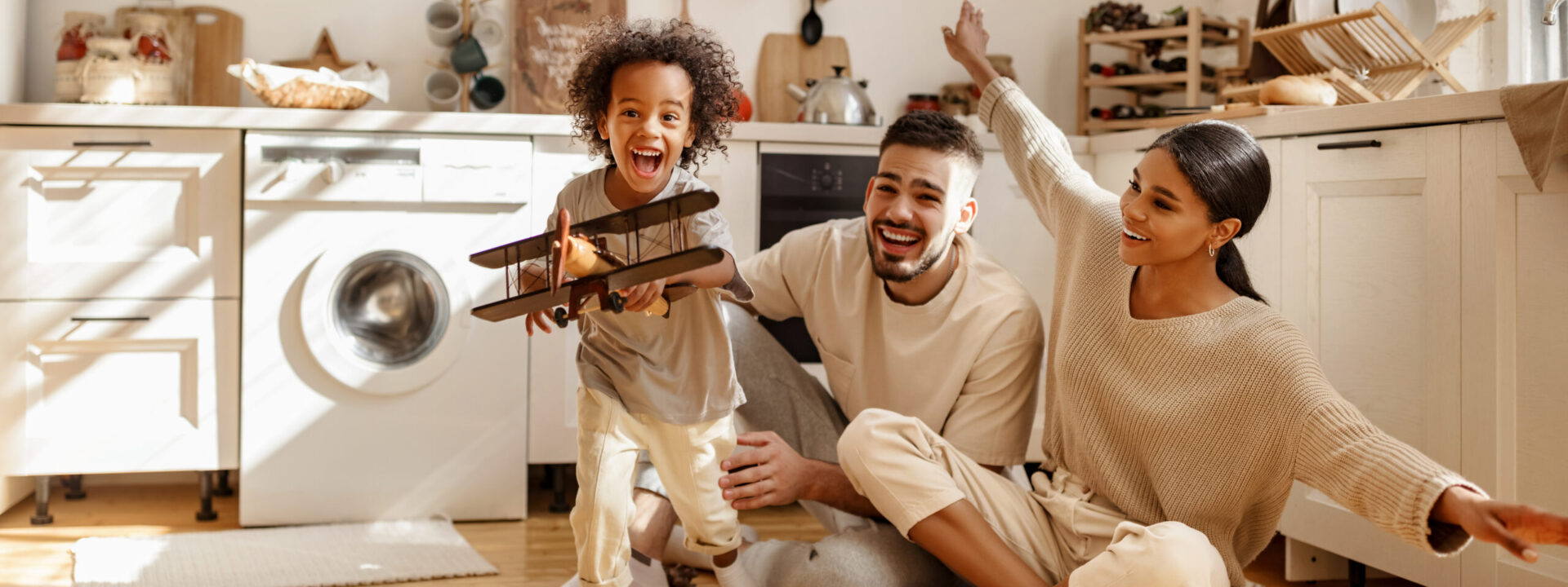 Happy,Multi,Ethnic,Family:,Little,Boy,Laughing,And,Playing,With